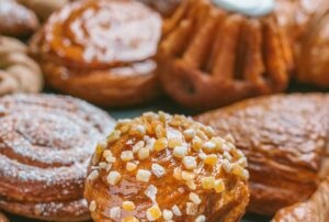 delicious fresh pastries on black table